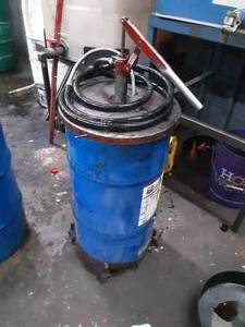 lot 365 image: EMPTY Delo Barrel on Cart with Hand Pump