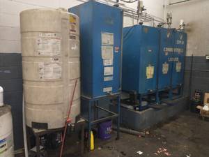 lot 403 image: Contents of 15W40 Oil 250 Gallons, Bring your own Oil Totes or Barrels. (Tank not included)