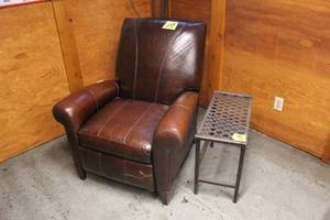 lot 437 image: Leather Recliner and Metal End Table made from Truck Step
