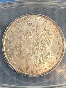 lot 03 image: 1897 US MORGAN SILVER DOLLAR ANACS MS64