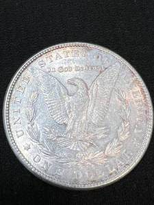lot 27 image: 1885 US MORGAN SILVER DOLLAR