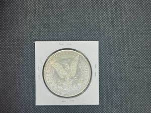 1884-O  Morgan Silver Dollar Marked MS63 When Purchased