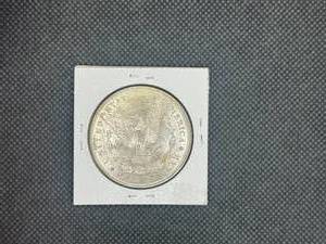 1885-O Morgan Silver Dollar Marked MS64 When Purchased