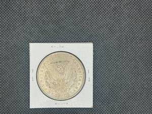 1900  Morgan Silver Dollar Marked MS63 When Purchased