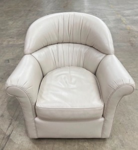 lot 29 image: Creamy Pleather Swivel Accent Armchair