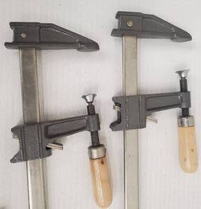 lot 290 image: 2 Metal Clamps & 2 Mini Clamps