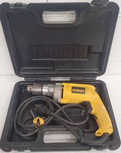 lot 292 image: DEWALT Corded Drill DW235G, Drill Bit Case, & Saw