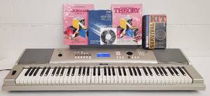 lot 306 image: YAMAHA Model YPG-225 Portable Piano
