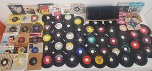 lot 313 image: Huge Lot of 45s Records wMCM Metal Rack
