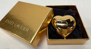 lot 464 image: New Old Stock ESTEE LAUDER Lucidity Heart Compact with Jewel Pin Opener