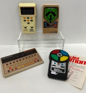 lot 379 image: Pocket Simon, Brain Baffler, Mattel Baseball, & Straco Football Handheld Games