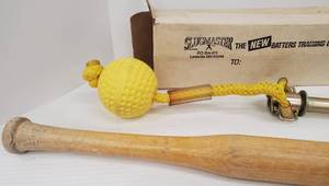lot 497 image: Vintage Louisville Slugger Wood Bat & Slugmaster Batter Training Device
