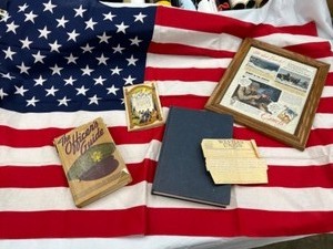lot 604 image: Vintage Military Lot Soldiers Items, American Flag, Camels Cigarette Ad from WWII, M.I.A. Letter & More