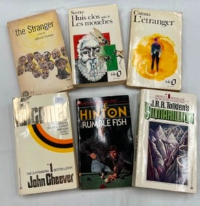 lot 608 image: Vintage 1940s Lot of PAPERBACK Novels Camus Tolkien, Cheever & Hinton