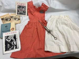 lot 627 image: Vintage 60s Candy Striper NURSE Ada Outfit, Books & Large Tube Shot Collection