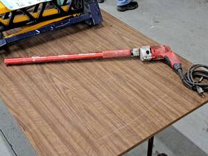 lot 888 image: Milwaukee Magnum Screwshooter 14 Drill 6794-1 with OMG Products Tall Boy Attachment