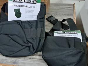 lot 1084 image: Lot of (2) Uncle Mikes Padded Shell Bag