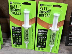lot 1154 image: Lot of (2) Breakthrough Battle Born Grease