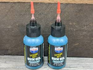 lot 1129 image: Lot of (2) Lucas Oil Extreme Duty 1-oz Gun Oil