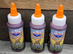 lot 1130 image: Lot of (3) Lucas Oil 2-oz Gun Oil