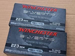 lot 847 image: Lot of (2 Boxes) Winchester Defense Tip Silvertip 223 REM 64 gr Centerfire Rifle Cartridges 20-count