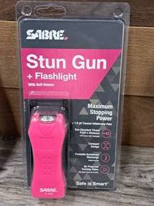 lot 1292 image: Sabre Stun Gun  Flashlight with Belt Holster
