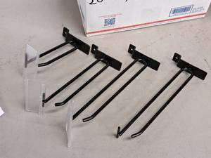 lot 1314 image: Lot of (111) Assorted Slat Wall Pegs with Price Tag Holders