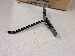 lot 1314F image: Lot of (26) 4 Slat Wall Pegs