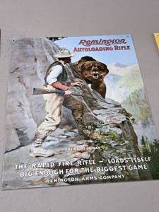 lot 1351 image: Remington Autloading Rifle Tin Sign 12-12x16