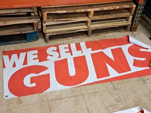 lot 1336 image: We Sell Guns Banner 63-12