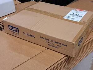 lot 1384 image: Uline 2-mil Die Cut Handle Bags S-15385BL 500-count