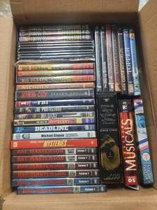 Box of DVDs from various genres