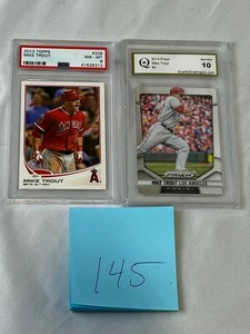 lot 145 image: Mike Trout Lot - 2013 Topps #338 PSA 8 & 2014 Prizm #3 QGS 10
