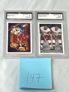 lot 147 image: 1990 Upper Deck Young Guns #521 (FGS 10)  1991 Upper Deck Brett Hull #9 (FGS 10)