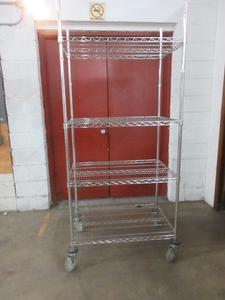 lot 236 image: NEXEL INDUSTRIES CHROME WIRE SHELVING  WITH WHEELS