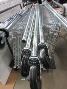 lot 242 image: CHROME WIRE SHELVING UNIT WITH WHEELS