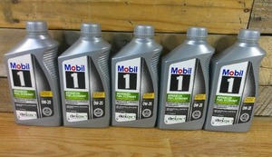 lot 74 image: 4 qts & 400M ml of Mobil 1 Advanced Fuel Economy Synthetic Motor Oil 0W20 Green