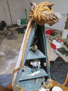 26 partial Canoe Shaped table or wall shelf with 3-small tiers to display the fisherman decor it comes with or add your own