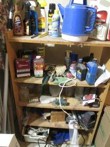 All content on garage shelf to include automotive cleaners and fluids, outdoor chemicals and decor along with other Misc supplies