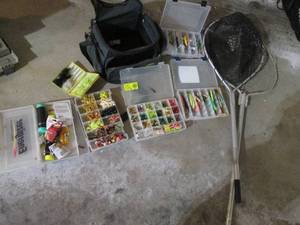Soft sided tackle box with lures, baits and other fishing supplies along with (2) nets