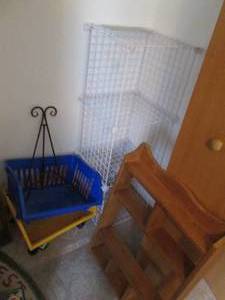 Corner lot of organization goodies. Wood wall display shelf. approximately 3021, stacking baskets, cube style stacking Bins and metal art holder display