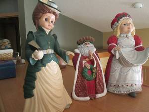 Trio of ceramic Christmas statues ranging from 16-24