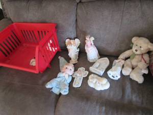 Lot of Precious Moments figurines along with other nik naks and decor