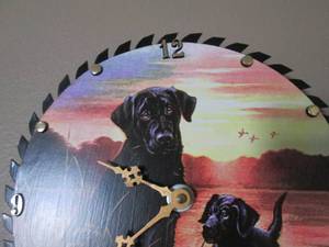Hunting Black Labrador painted on a Saw blade-turned Clock