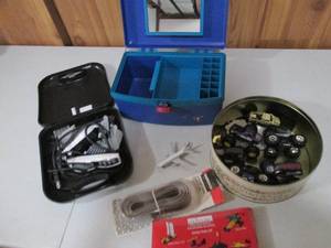 Collectible Christmas tin, Caboodle organizer and other toys and household supplies