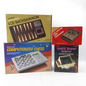 lot 87 image: Grouping of Vintage Radio Shack & Tandy Electronic Games