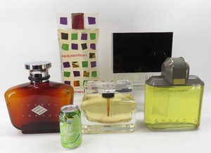 lot 89 image: Grouping of Vintage Factice Perfume Advertising Store Display Bottles