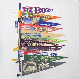 lot 103 image: 11 Vintage Travel Souvenir Pennants, Gravedigger Monster Truck, BOZO Clown, State Fairs & More