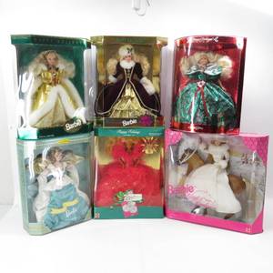 lot 233 image: Lot of 6 Vintage Holiday Barbies - Never removed from box