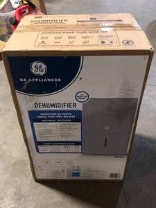 lot 5 image: GE 50-Pint Dehumidifier with Built-in Pump for Basement, Garage or Wet Rooms up to 4500 sq. ft. in Grey  Customer Returns See Pictures